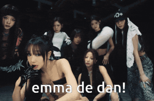 a group of young women are posing for a picture and one of them is named emma de dan