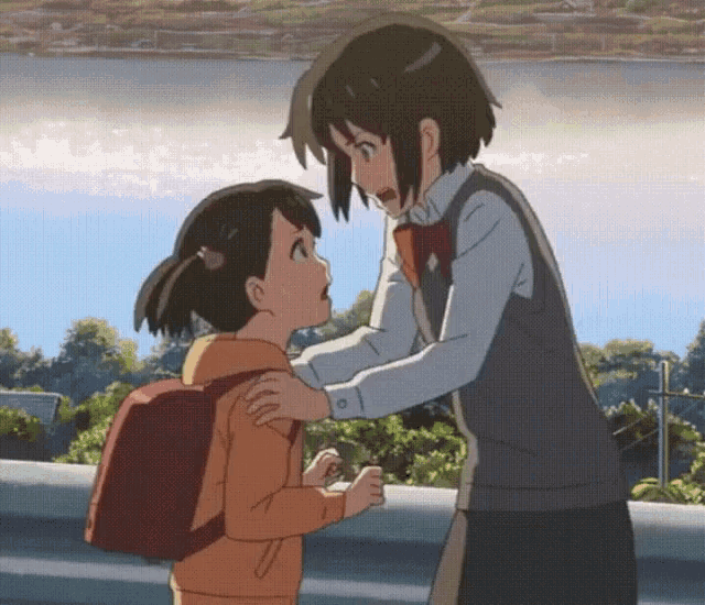a girl in a school uniform is hugging another girl with a backpack .