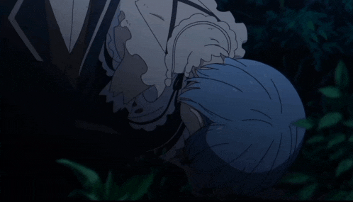 a person with blue hair is laying down in a dark forest