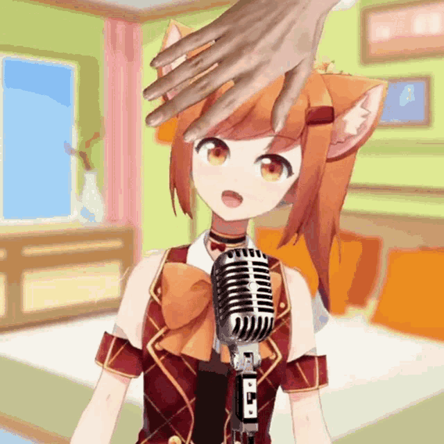 a hand touches the head of a girl with a microphone in front of her