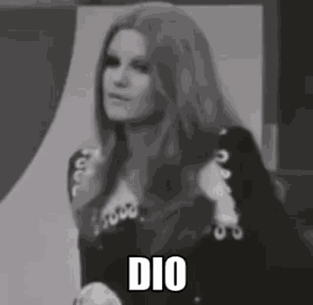 a black and white photo of a woman with long hair and the word dio written on it .