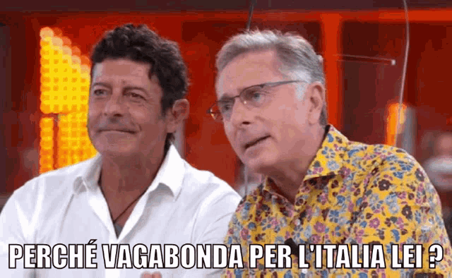 two men are sitting next to each other with the words perche vagabonda per l ' italia lei