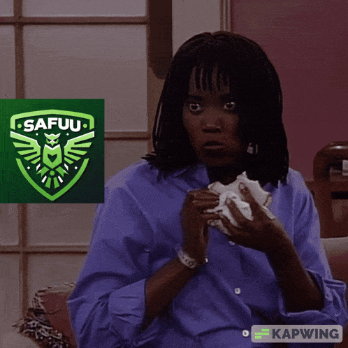 a woman wipes her nose with a napkin in front of a logo for safuu
