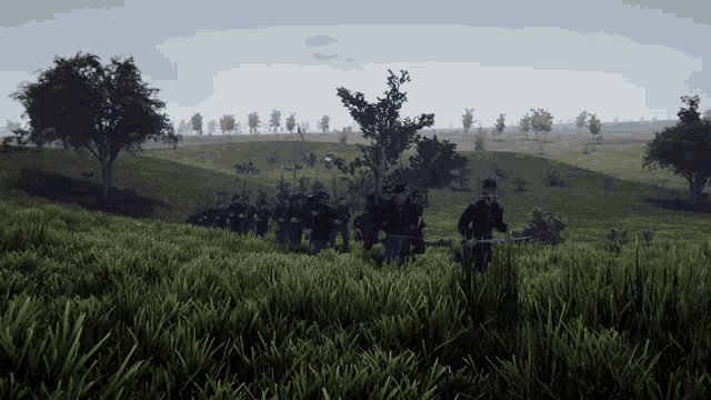 a group of men are walking through a grassy field