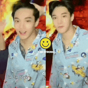 a young man wearing a blue shirt with a smiley face on it