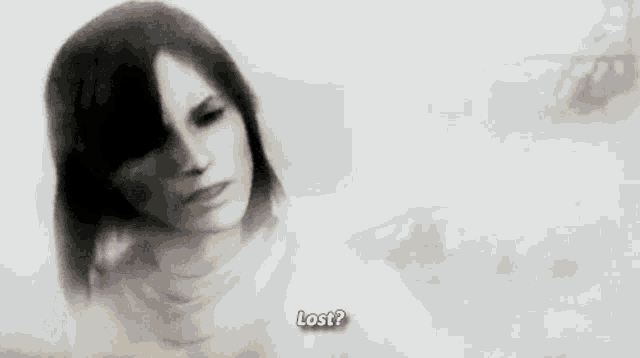 a black and white photo of a woman with the words lost on the bottom right