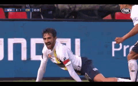 a soccer game is being played on fox sports channel