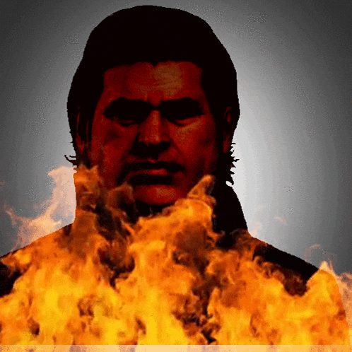 a silhouette of a man surrounded by fire