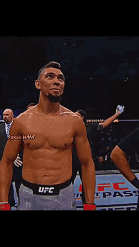 a man without a shirt has a tattoo on his shoulder that says @bjkmma
