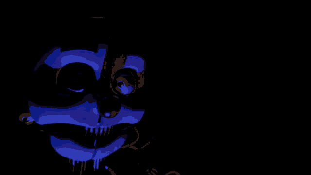a blue and white cartoon character with yellow eyes and teeth