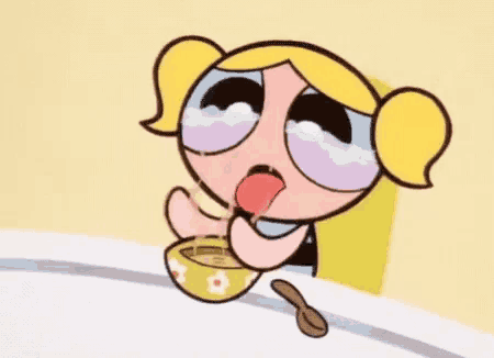 bubbles from the powerpuff girls is drinking from a bowl with a spoon next to her