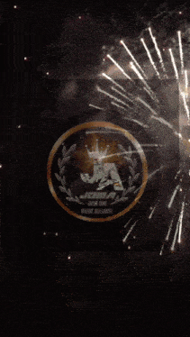 a joma logo is surrounded by fireworks in the background