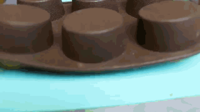 a tray of chocolate candies on a table .