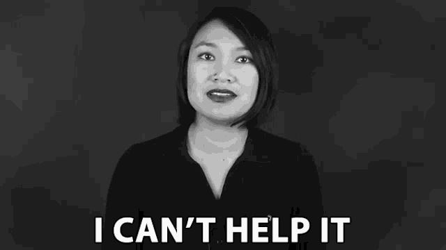 a woman in a black shirt says i can 't help it