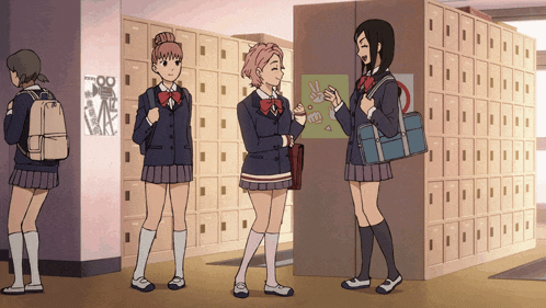 a group of girls are standing in a hallway with lockers and a sign that says ' peace ' on it