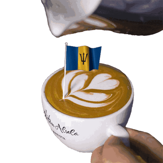 a cup of coffee with a flag on top of it