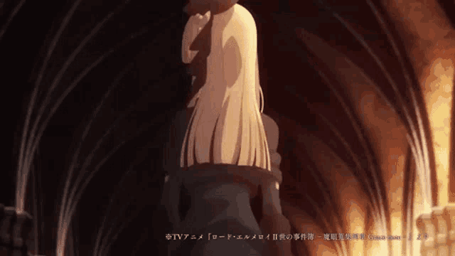 a woman in a black dress stands in a dark room