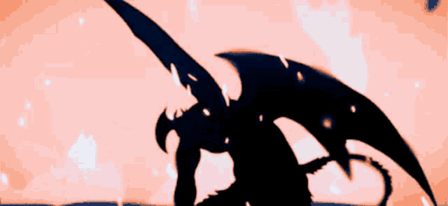 a close up of a silhouette of a dragon flying in the air .