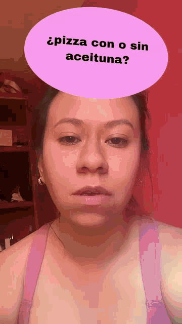 a woman is wearing a pink tank top with a pink circle above her head that says pizza con o sin aceituna