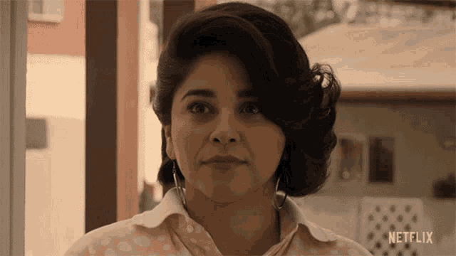 a woman 's face is shown in a netflix advertisement