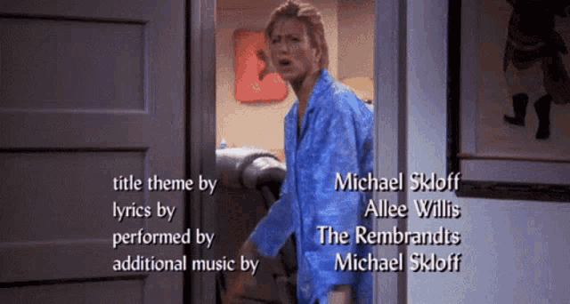 a woman in a blue robe is standing in a doorway with the words title theme by lyrics by performed by additional music by michael skloff