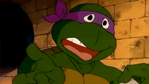 a teenage mutant ninja turtle with a purple headband on his head