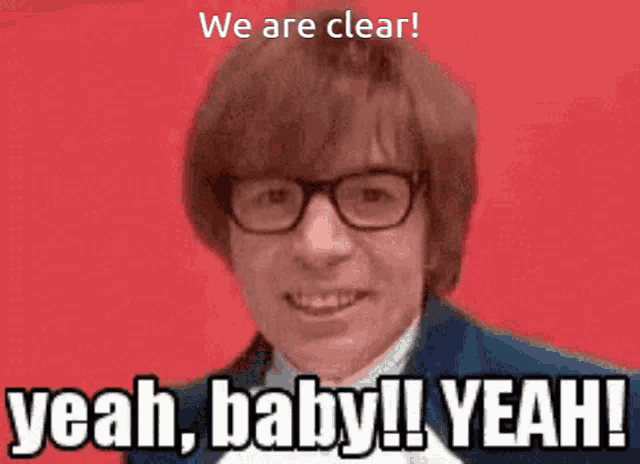 a man wearing glasses is screaming with the words we are clear yeah baby yeah