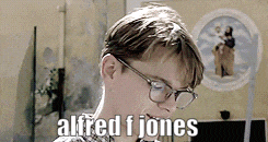 a young man wearing glasses says alfred jones