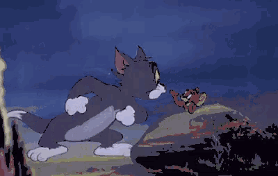 a pixelated cartoon of tom and jerry fighting