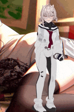 a girl in a white suit with a red tie is standing in front of a couch