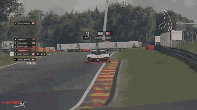 a video game screen shows a race car going around a track with the number 3 on it