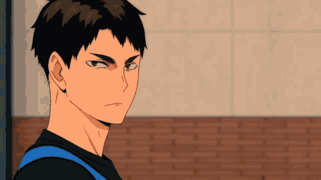 a close up of a cartoon character with a brick wall in the background