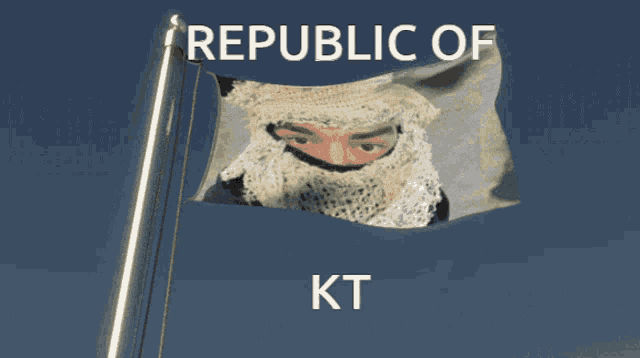 a flag that says republic of kt with a picture of a man covering his face