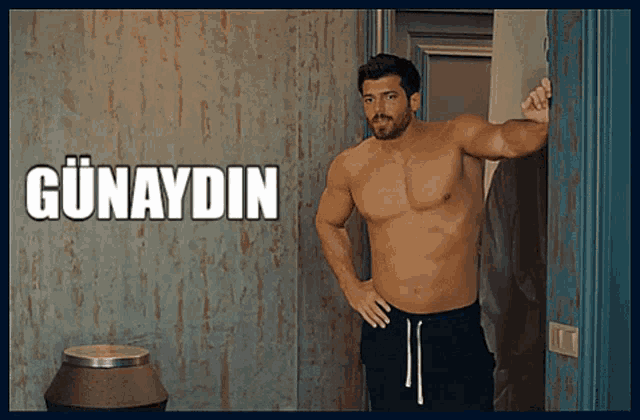 a shirtless man leans against a door with the word günaydin written on the bottom