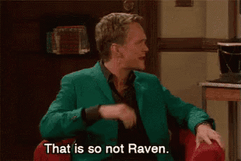 a man in a green suit is sitting on a red couch and says that is so not raven .