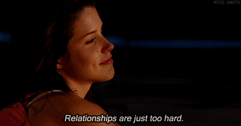 a woman says " relationships are just too hard " in the dark