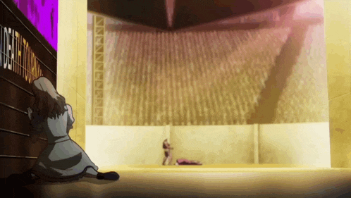 a woman is kneeling down in front of a wall with the word death on it