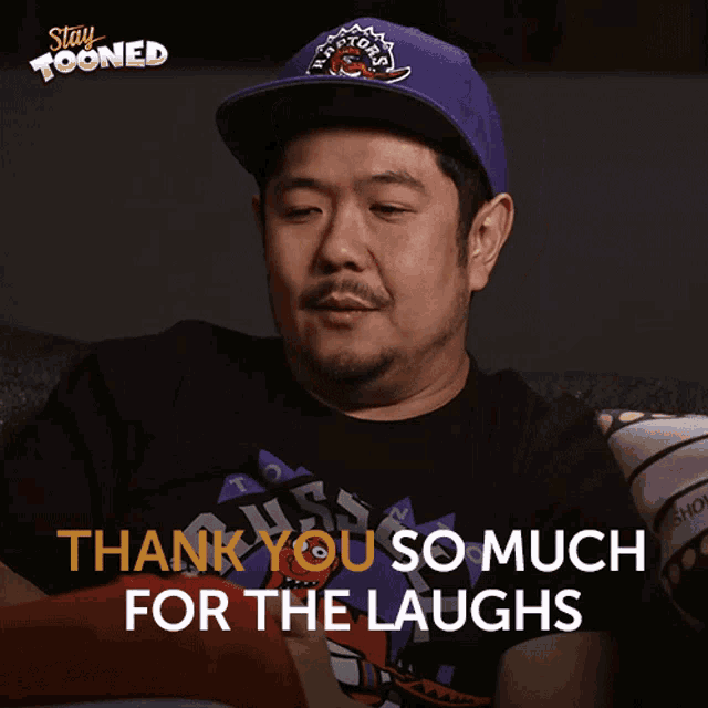 a man wearing a purple hat and a black shirt says thank you so much for the laughs