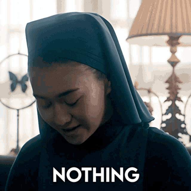a picture of a nun with the word nothing on the bottom