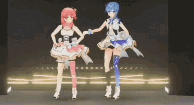 two anime girls are dancing on a stage and holding hands