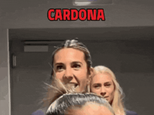a woman with the name cardona written on her face