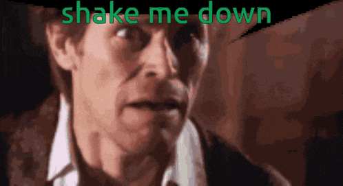 a man 's face is shown with the words shake me down above him