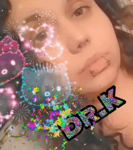 a woman 's face is surrounded by fireworks and the name dr.k