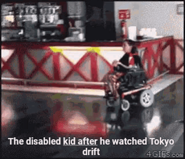 a disabled kid in a motorized wheelchair is watching tokyo drift