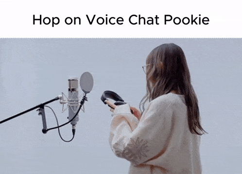 a woman singing into a microphone with the words hop on voice chat pookie
