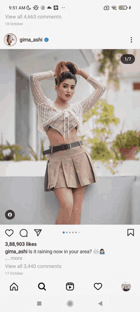 a screenshot of gima_ashi 's instagram page with a picture of a woman in a crop top and pleated skirt