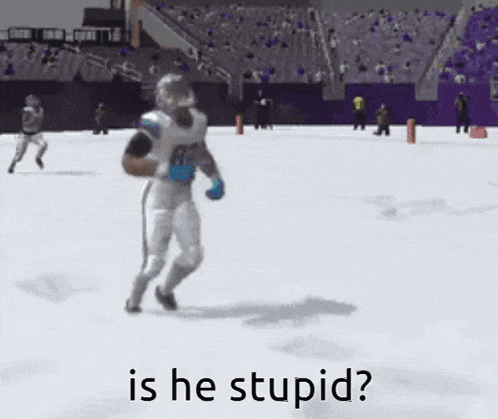 a football player with the number 82 on his jersey is running in the snow