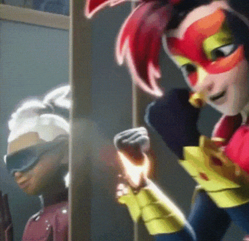 a cartoon character with red hair and a yellow glove is standing next to another cartoon character in a cage .