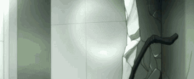 a person is walking down a staircase in a room with a broken railing .