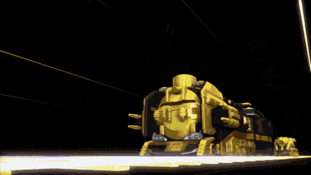 a yellow and red toy train is going down a track